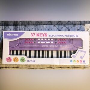 Purple 37-Key Electronic Keyboard